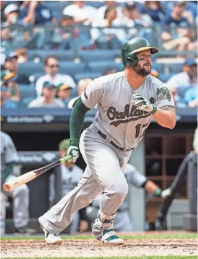  ?? GREGORY FISHER, USA TODAY SPORTS ?? The Athletics’ Yonder Alonso is hitting .285 with 14 home runs and 31 RBI to go along with a .384 on-base percentage and a .642 slugging percentage.
