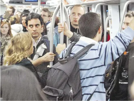  ?? RICK STEVES ?? City transit lines that cover tourist sights (such as Rome’s metro Line A) are happy hunting grounds for pickpocket­s on the prowl. Some pose as tourists or may be well-dressed to blend in with workday crowds.