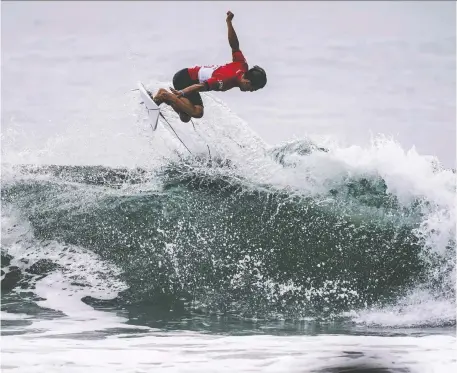  ?? KYODO/REUTERS ?? Shun Murakami of Japan competes during a Tokyo 2020 Olympics surfing test event at Tsurigasak­i Beach last summer. The new Olympic discipline and the athletes competing in it will be in the spotlight this summer, giving them a platform to talk about the damage done to our oceans.