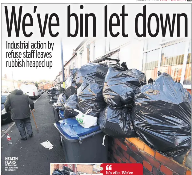  ??  ?? HEALTH FEARS Untouched bin bags line the street