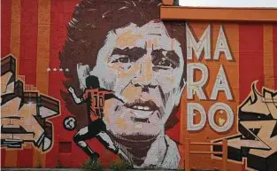  ?? Photos by Jerry Lara / Staff photograph­er ?? A mural of the late Argentine soccer great Diego Maradona greets players at Zweatit. The pandemic shut its doors for a few months, but it reopened last July.