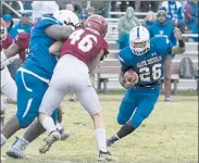  ?? SENTINEL & ENTERPRISE FILE ?? Leominster's Justus-Tyler Reynolds carries the ball during the 2019 Thanksgivi­ng Day game against Fitchburg. Friday’s game between the schools has been canceled.