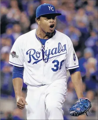  ?? Charlie Riedel
Associated Press ?? EDINSON VOLQUEZ celebrates after last out in the sixth; he had been 0-3 in postseason starts.