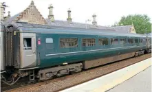  ?? ?? Slam door Mk.3 coaches to match the HST power cars will be finished in GWR (shown), BR blue and grey together with InterCity. Sufficient trailers for complete train formations are being tooled, including catering, and TGS vehicles, priced at £32.49.