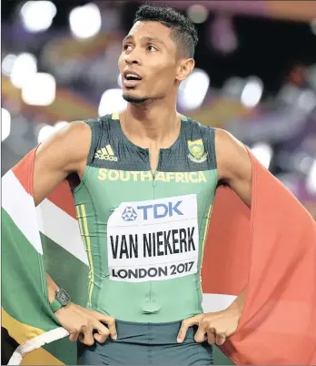  ?? PICTURE: EPA ?? SILVER LINING: Wayde van Niekerk reacts after finishing second to Turkey’s Ramil Guliyev in the men’s 200m final at the IAAF World Championsh­ips in London, on Thursday night.