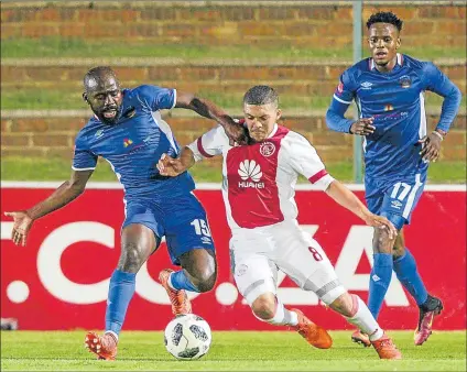  ?? Picture: GALLO IMAGES ?? GOING ALL OUT: Chippa United’s Sandile Zuke, left, and Grant Margeman of Ajax Cape Town in action during their league match at Bidvest Stadium in Johannesbu­rg on Saturday