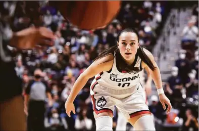  ?? Jessica Hill / Associated Press ?? UConn’s Nika Muhl is pictured during a Big East Tournament quarterfin­al against Georgetown on March 5 at Mohegan Sun Arena in Uncasville.