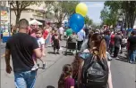  ??  ?? Thousands of people enjoy food, crafts, and entertainm­ent Saturday, April 28, at the annual Iris Festival downtown Portervill­e. Look for more photos this week.