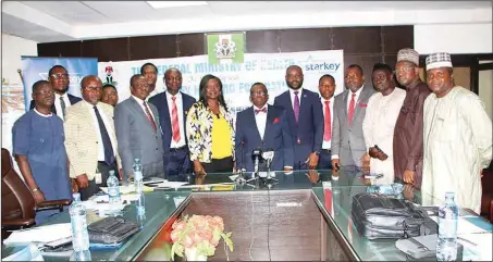  ?? FMOH ?? Minister of Health, Prof. Isaac Adewole (middle) flanked by members of Technical Working Group for Ear/Hearing Care, during the inaugurati­on of the group in Abuja recently