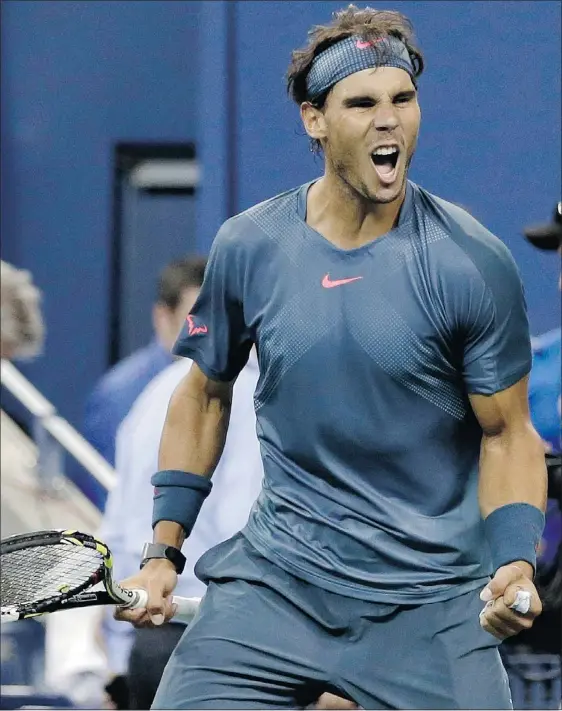  ?? — THE ASSOCIATED PRESS ?? Rafael Nadal defeated Tommy Robredo 6-0, 6-2, 6-2 in their quarterfin­al at the U.S. Open tennis tournament Wednesday.