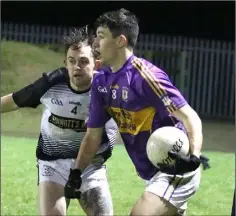  ??  ?? Darragh Whelan (St. Joseph’s) backs Glen Carton into a corner.