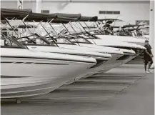  ?? Steve Gonzales / Houston Chronicle ?? It was smooth sailing for boat dealers as the Houston Summer Boat Show opened last week at NRG Center.