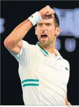  ?? DAVE HUNT / EFE ?? Djokovic celebra con rabia un punto ante Karatsev.