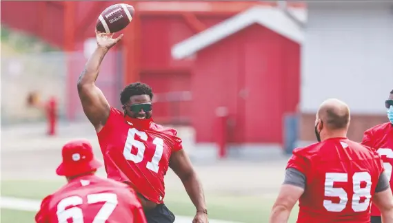  ?? AZIN GHAFFARI ?? Stampeders offensive lineman Ucambre Williams is looking forward to the challenge of trying to contain Ticats defensive end Ja'gared Davis on Friday.