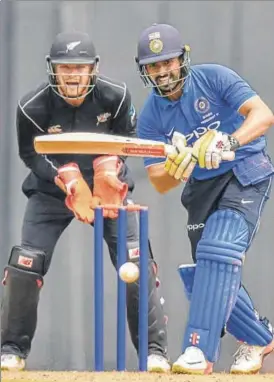  ?? KUNAL PATIL / HT PHOTOS ?? Board President’s XI batsman Karun Nair topscored for his side with 78; (left) Trent Boult, who took five 38, feels the heat at Brabourne Stadium on Tuesday.