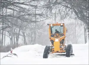  ?? CAPE BRETON POST PHOTO ?? A plow heads down Sydney’s Esplanade on Dec. 27, 2016, cleaning up after a post-Christmas storm.