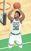  ?? KYLE TERADA/USA TODAY SPORTS ?? Marcus Smart dunks the ball during Game 4 against the Warriors.