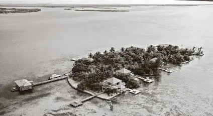  ?? Cayo Espanto ?? Cayo Espanto, a 4-acre private island off the coast of Belize in the Caribbean Sea, has butler-serviced villas with heated plunge pools. Guests can rent villas or the whole island.