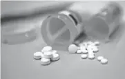  ?? ERIC BARADAT/AFP VIA GETTY IMAGES ?? Four pharmaceut­ical companies say they’ve received support from enough states to move to the next stage of a $26 billion settlement over thousands of legal claims related to the opioid epidemic, which has killed more than half a million Americans.