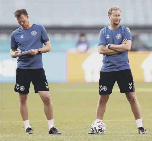  ??  ?? Former Dundee midfielder Morten Wieghorst, left, during a Denmark training session and, below, with Tommy Burns at Celtic