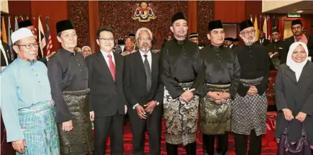  ??  ?? Taking their place: (From left) Husain, Ismail, Liew, Waytha Moorthy, Marzuki, Dr Mohd Radzi, Datuk Raja Kamarul Bharin Shah and Asmak Husin after taking their oaths during the opening of the first session of Parliament.