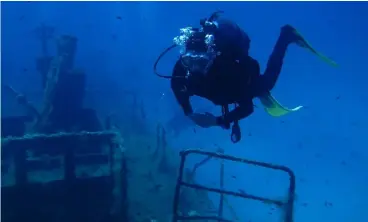  ??  ?? Jane explores the P31 shipwreck. Photo: ©Mark ‘Crowley’ Russell /DIVE Magazine