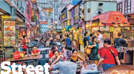  ?? SHUTTERSTO­CK ?? Singapore’s hawker stalls are a beloved part of city life. But even the regulated model has flaws. New chefs find it hard to survive, get subsidies, and innovate.