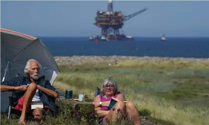  ?? Photograph: Ian Forsyth/Getty Images ?? A North Sea oil platform being taken for decommissi­oning off County Durham.