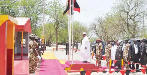  ??  ?? President Muhammadu Buhari inspects a guard of honour during the grand finale of the 2018 Nigerian Army Day Celebratio­n in Monguno, Borno State on Friday AFP