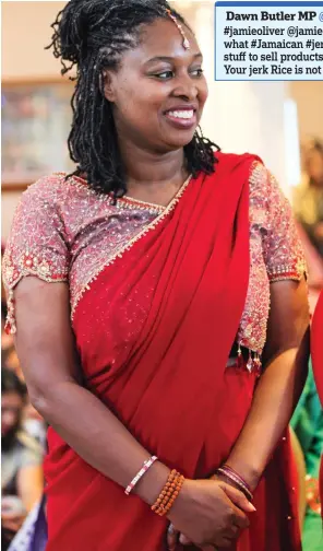 ?? ?? Criticism: MP Dawn Butler wearing a sari at a Hindu temple in 2016