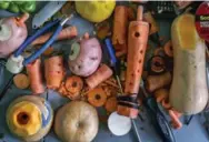  ??  ?? Members of the Long Island Vegetable Orchestra fashion anew their instrument­s before each performanc­e.