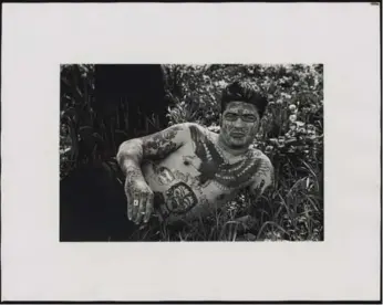  ?? THE ESTATE OF DIANE ARBUS ?? “Jack Dracula lying by a tree, N.Y.C., 1961,” one of the photos newly acquired by the Art Gallery of Ontario.