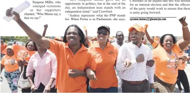  ?? JERMAINE BARNABY/FREELANCE PHOTOGRAPH­ER ?? Audrey Smith Facey (second left) being supported by Damion Crawford (left) Raymond Pryce (second right) and a supporter at the party’s candidate election for the St Andrew South Western constituen­cy yesterday.