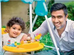  ?? MOMMYSHOTS-BY AMRITA ?? ADORABLE: Ravichandr­an Ashwin with his daughter —