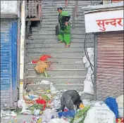  ?? DEEPAK SANSTA/HT ?? Trash strewn on a street at Lower Bazaar in Shimla on Tuesday.