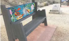  ??  ?? Marina Papais’ bench featuring a mosaic depicting a dragon and koi is part of a memorial at the Chinese Cemetery.