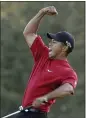  ?? AP FILE ?? Tiger Woods reacts to winning the 2005Master­s in a playoff with Chris DiMarco on the 18th hole during final round play of the tournament at the Augusta National Golf Club in 2005.