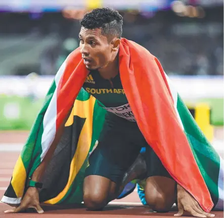  ??  ?? South Africa's Wayde van Niekerk reacts after winning the final of the men's 400m at the world championsh­ips in London.