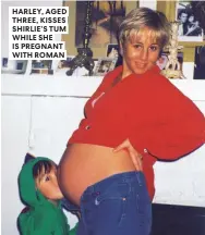  ??  ?? HARLEY, AGED THREE, KISSES SHIRLIE’S TUM WHILE SHE IS PREGNANT WITH ROMAN