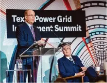 ?? Kirk Sides/staff file photo ?? Lt. Gov. Dan Patrick listens as Larry Fink, chairman and CEO of financial giant Blackrock, speaks at the Texas Power Grid Investment Summit last month in Houston.