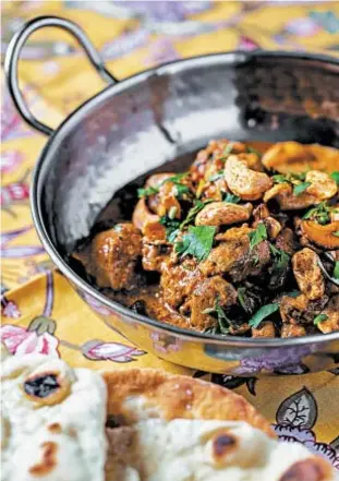  ?? ROBERT ROSE ?? Butter chicken with spiced cashews from “The Complete Indian Instant Pot Cookbook.”