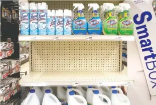  ?? STAFF PHOTO BY C.B. SCHMELTER ?? An empty shelf among cleaning supplies at Elder’s Ace Hardware on Dayton Boulevard that once held disinfecta­nt wipes is seen Wednesday. The store was out of the wipes and other items such as respirator masks.