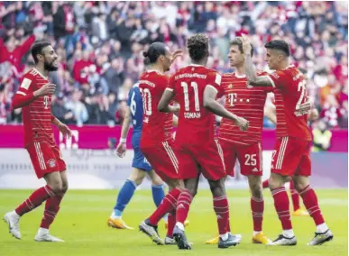  ?? (Photos: AP) ?? Munich’s scorer Thomas Mueller (second right), and and his teammates celebrate the opening goal during the German Bundesliga soccer match between FC Bayern Munich and FC Schalke 04 in Munich, Germany, Saturday, May 13, 2023.