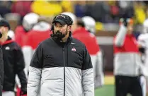  ?? CARLOS OSORIO / ASSOCIATED PRESS ?? The realist in Ohio State coach Ryan Day won’t allow him to get caught up in the preseason hype and rankings surroundin­g his football team.