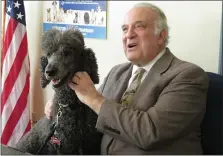  ?? SUBMITTED PHOTO ?? State Sen. Andy Dinniman and his rescue poodle, Jagger, participat­e in the Humane Society of the United States – Pennsylvan­ia’s virtual Humane Lobby Week during which he received the organizati­on’s Companion Animal Guardiansh­ip award.