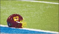  ?? RICK OSENTOSKI — THE ASSOCIATED PRESS FILE ?? The helmet of Washington Football Team offensive guard Wes Martin (67) on the field against the Detroit Lions during an NFL football game in Detroit on Nov. 15.