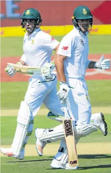  ?? /Lee Warren/Gallo Images ?? Up and running: openers Aiden Markram, right, and Dean Elgar cross for a run as they keep the scoreboard ticking over. However, the pair got into a muddle later on when Markram was run out on 97.