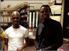  ??  ?? DAPPER . . . Knowledge Musona (left) out shopping for stylish clothes