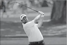  ?? JOHN RAOUX/AP PHOTO ?? Shane Lowry hits a shot from the first fairway during the third round of the Arnold Palmer Invitation­al on Saturday in Orlando, Fla.