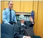  ?? AFP ?? A justice officer pushes the 94-years-old defendant to the courtroom for his trial at the regional court in Muenster, Germany. —